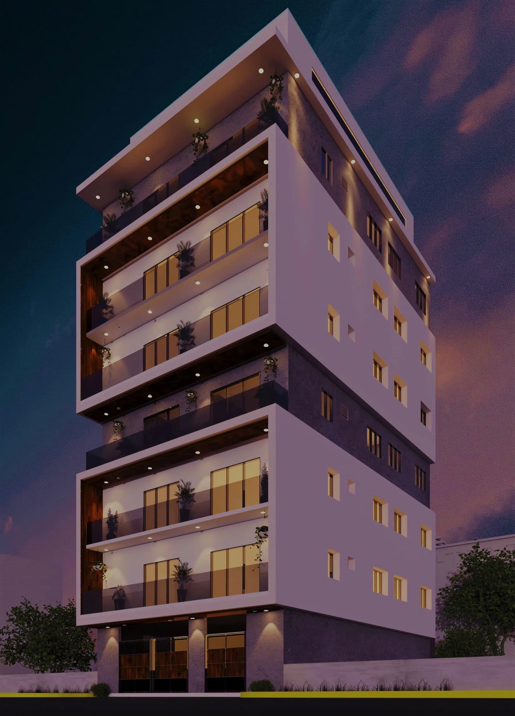 Night exterior view of a multi-storey residential building