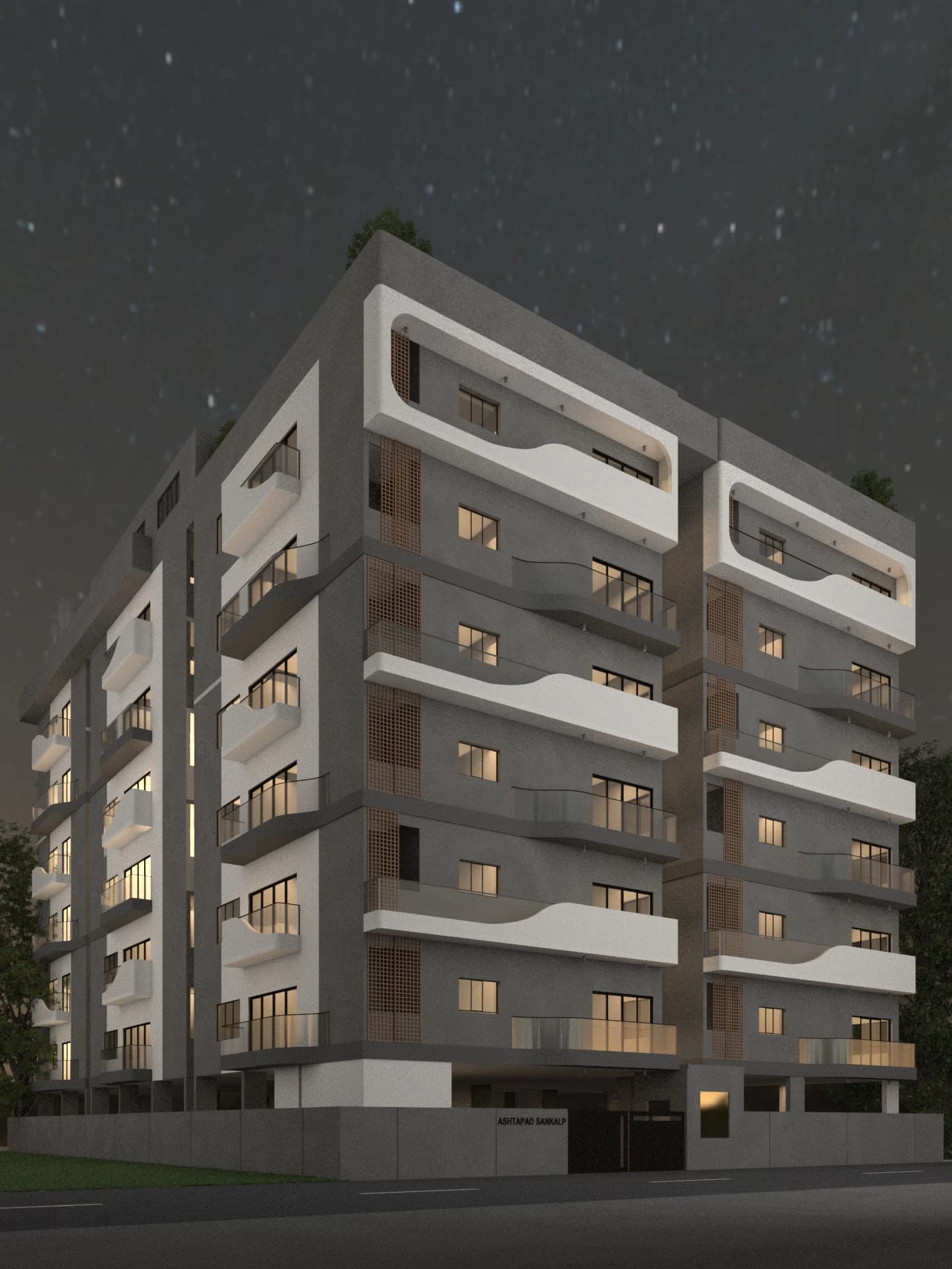 Night exterior view of a multi-storey residential building