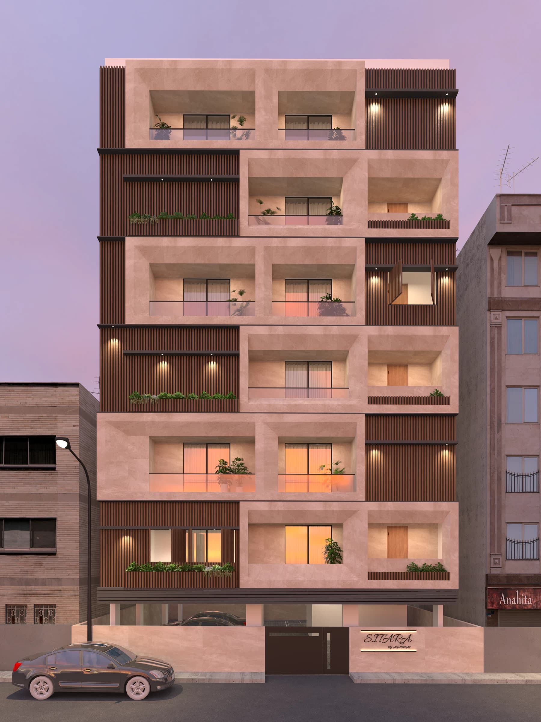 Night exterior view of a residential building with balconies