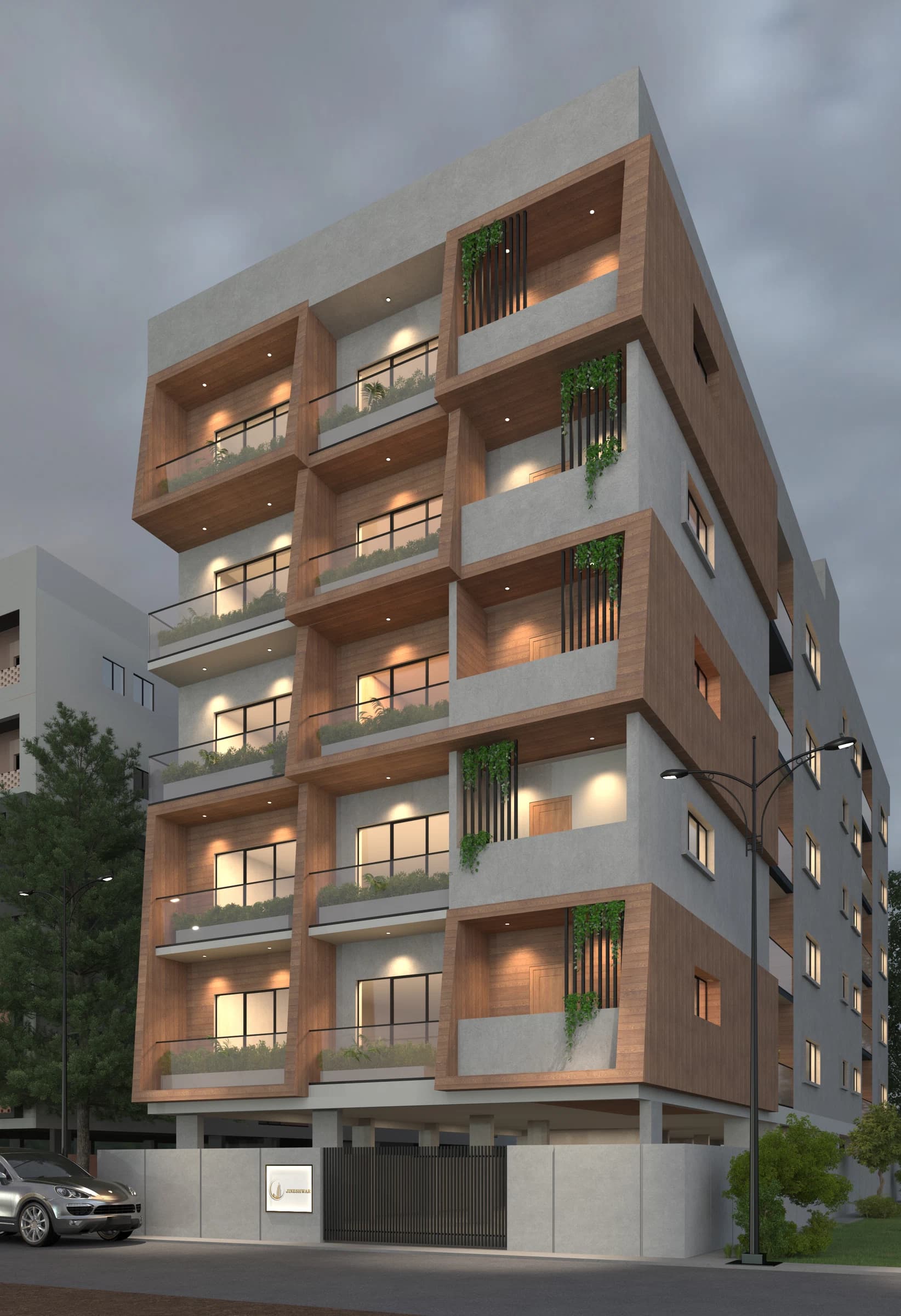 Night exterior view of a residential tower