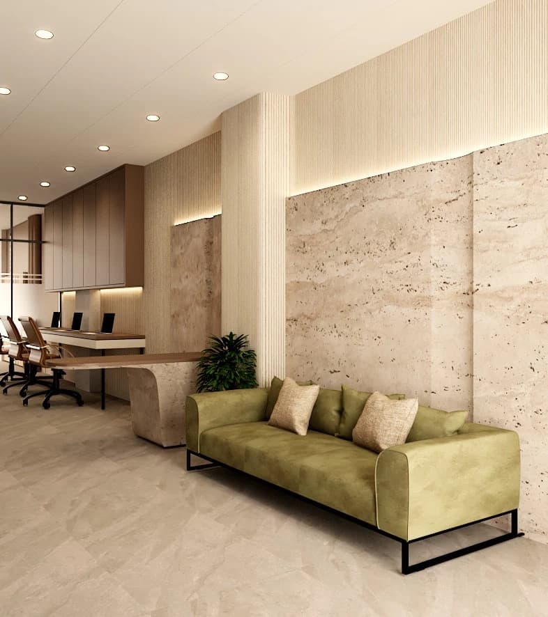 Reception seating area with sofa and textured wall