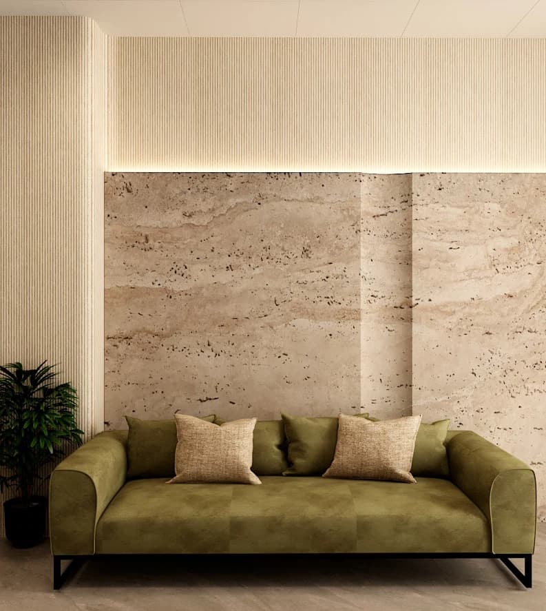 Close view of reception sofa and textured wall