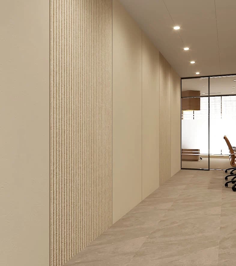 Reception area with desk, seating, and warm wall lighting