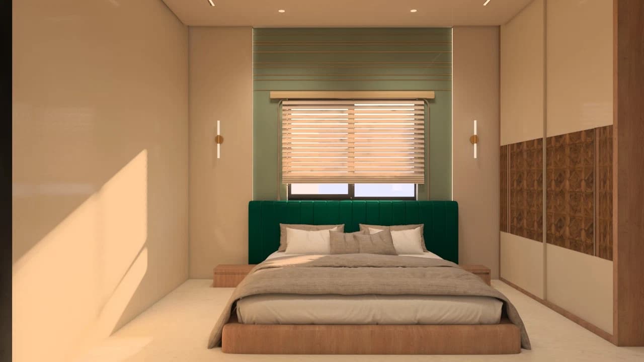 Bedroom with bed and green accent wall
