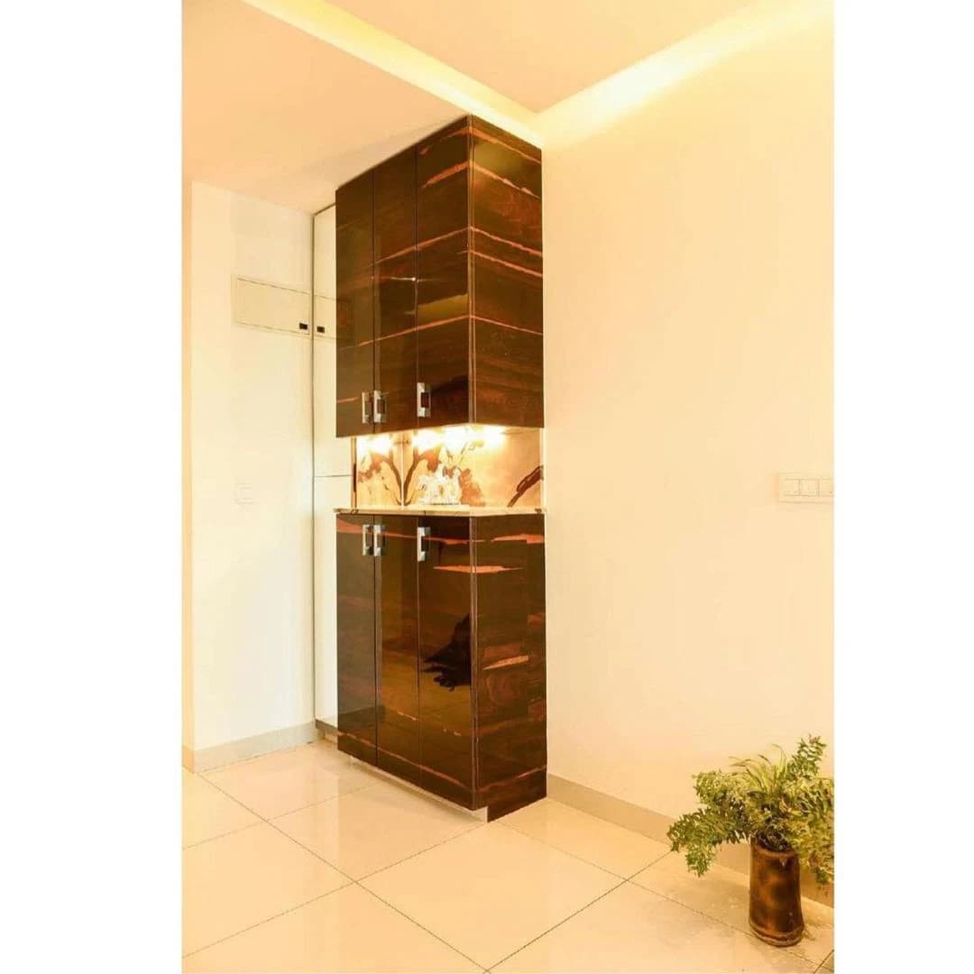 Entry wall with console and vertical wood paneling