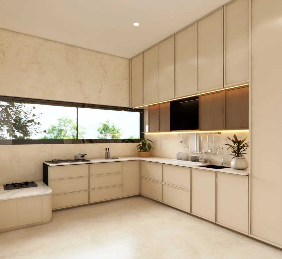 Kitchen interior with light cabinetry and a long window