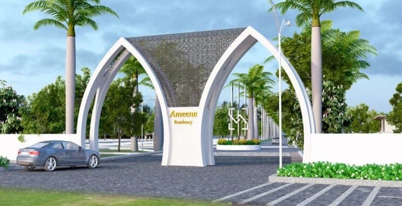 Entrance gateway with roadway and palm trees