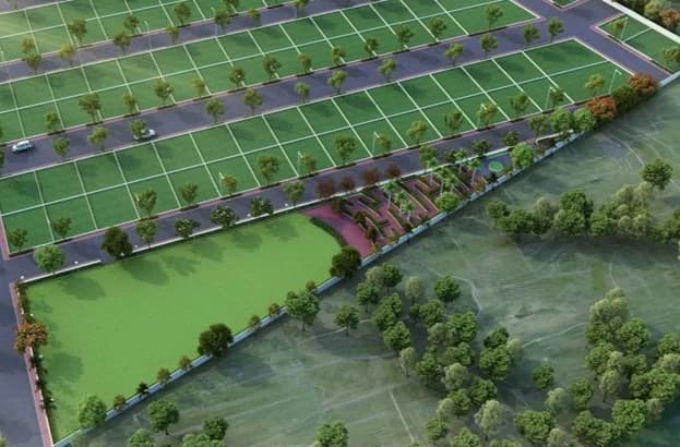 Aerial view of green plots and internal roads